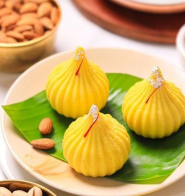 golden modak candle – pack of 4 | festive glow collection